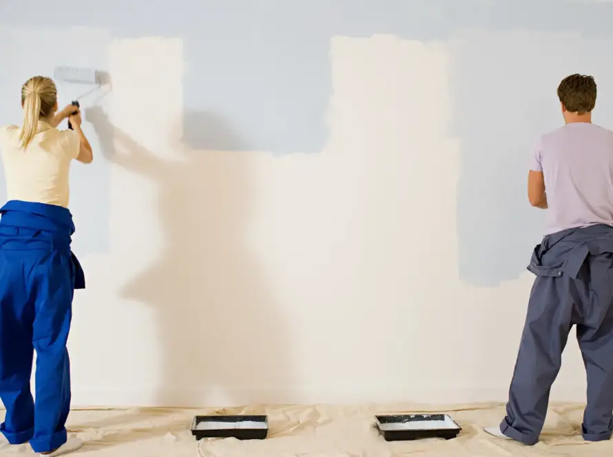 Affordable Painter painting interior walls of a modern home